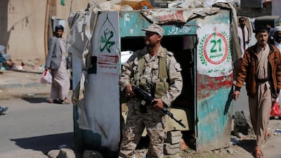 A Houthi militant mans a checkpoint as clashes with forces loyal to Yemen's former president, Ali Abdullah Saleh, continue in Sanaa on December 4, 2017. Khaled Abdullah / Reuters