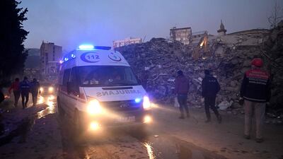 Rubble of collapsed buildings is piled high as rescue efforts continue in Turkey, near the border with Syria. AFP