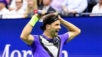 Grigor Dimitrov begins the celebrations after beating Roger Federer in the quarter-finals of the US Open. Reuters