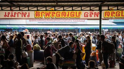 Migrant workers from Cambodia wait to cross the Ban Laem border checkpoint in Chanthaburi, Thailand, following a ceasefire between the countries. Getty Images