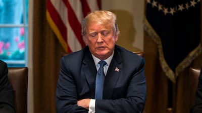 President Donald Trump speaks with the media before a meeting with his military leadership in the Cabinet Room of the White House. Mr Trump declared an FBI investigation into Russian election meddling a "witch hunt". Jim Lo Scalzo / EPA