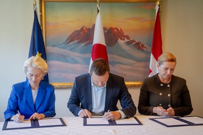 From left, European Commission President Ursula von der Leyen, Greenland's government leader Jens-Frederik Nielsen and Danish Prime Minister Mette Frederiksen sign a joint declaration in Nuuk. EPA