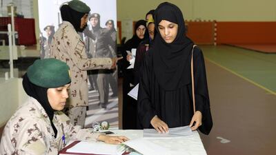 Volunteers register for National Service at Khawla bint Al Azwar Military School. Wam