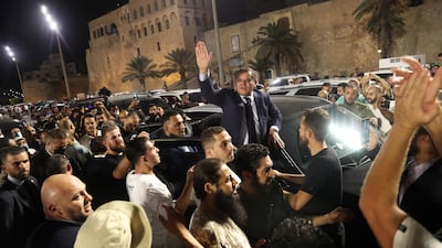 Acting Libyan Prime Minister Abdul Hamid Dbeibah addresses a crowd of his supporters in Tripoli after members of Parliament earlier in the day passed a no-confidence vote in the unity government. EPA
