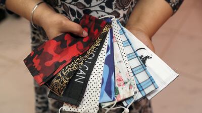 Her triple-layered, cotton, washable face covers come in a variety of colours and styles