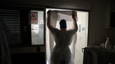 A medical worker prepares to tend to Covid-19 patients in the Amiens Picardie hospital, north of Paris. AP Photo
