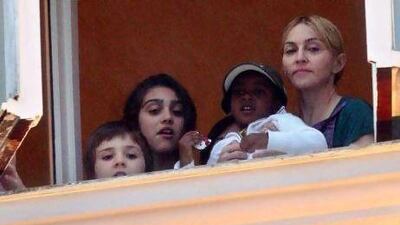 Madonna with her children. Marcos Arcoverde / Agenca Estado via AP Images