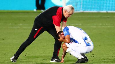 Leganes coach Javier Aguirre consoles Jonathan Silva. Reuters