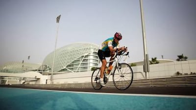 Cyclists ride around the Yas Marina Circuit during an event organised by a group called Cycle Safe.