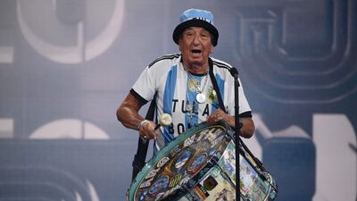 Argentina supporter El Tula delivers a speech as he received for Argentina supporters the Best Fifa Fan Award. AFP