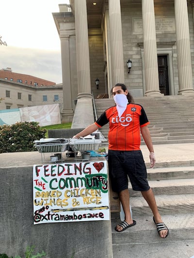 Omar was among the people offering food to protesters in Washington. Joyce Karam