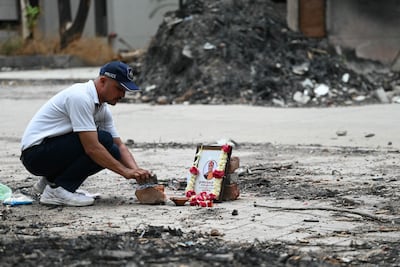 A tribute is set up for Air India Flight 171 plane crash victim at the site. AFP