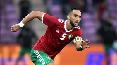 19 Morocco || The look: The other team sporting red and green, Morocco's kit stands out without screaming. Adidas' identikits have won this World Cup against their competitors Nike and Puma. || Would I wear it? No || Photo: Fabrice Coffrini / AFP Photo