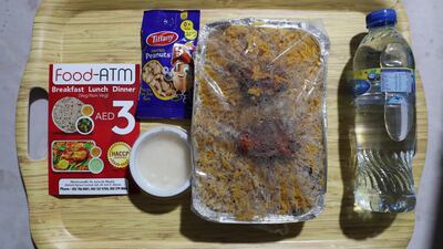 The Dh3 meal that was available at the Food ATM stall at Al Sajaa Labour Park during the Eid festival.