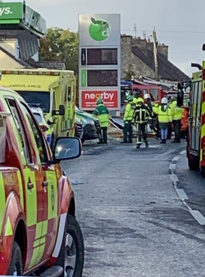 Emergency services at the scene at Applegreen service station in the village of Creeslough. PA