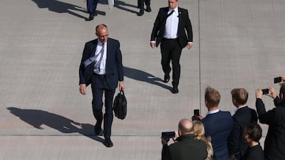 Mr Merz arrives to board the Konrad Adenauer government plane to fly to Paris. Taking office, he vowed to be 'a very European chancellor'. Getty Images