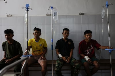 Injured soldiers queue to have their wounds cleaned at a hospital, after the leaders of Cambodia and Thailand agreed to a ceasefire on Monday. Reuters