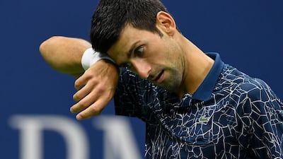 NEW YORK, NY - SEPTEMBER 09: Novak Djokovic of Serbia reacts during his men's Singles finals match against Juan Martin del Potro of Argentina on Day Fourteen of the 2018 US Open at the USTA Billie Jean King National Tennis Center on September 9, 2018 in the Flushing neighborhood of the Queens borough of New York City. Sarah Stier/Getty Images/AFP == FOR NEWSPAPERS, INTERNET, TELCOS & TELEVISION USE ONLY ==
