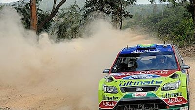 Finland's Jari-Matti Latvala and his co-diver Miikka Anttila power their Ford Focus through the special ninth stage of Rally Australia in New South Wales.