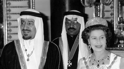 Queen Elizabeth II and King Khalid of Saudi Arabia at a State banquet at Buckingham Palace, June 9, 1981. PA Archive/PA Images