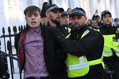 Police detain a man close to a major pro-Palestinian demonstration in London on Saturday, the UK's Armistice Day. British Prime Minister Rishi Sunak had described the march as 'provocative and disrespectful' and far-right counter-protesters scuffled with police. AFP