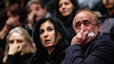 Mourners attend a memorial for the victims of a Ukrainian passenger plane which was shot down in Iran, at Convocation Hall in Toronto, Ontario, Canada January 12, 2020. Carlos Osorio / Reuters