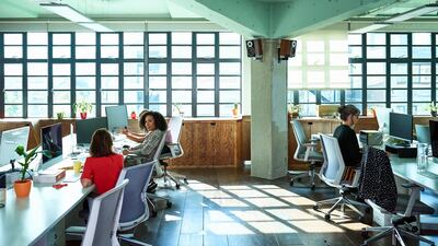 A warehouse-style open plan office. Getty Images