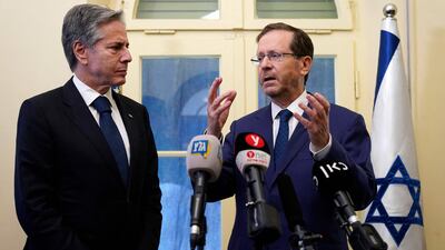 Mr Blinken and Israel’s President Isaac Herzog during a media briefing at the Kirya, in Tel Aviv. AFP
