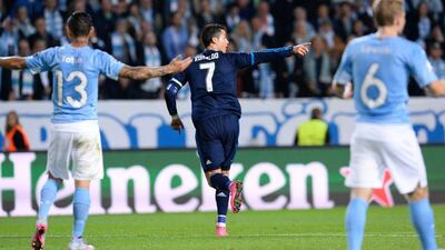 Cristiano Ronaldo of Real Madrid celebrates the first of his two goals in his team's 2-0 Champions League win over Malmo in Sweden on Wednesday night. Jonathan Nackstrand / AFP
