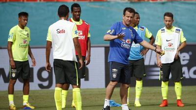 Dunga, centre, and Brazil will get the chance to see what impact he can make on the national team when they face Colombia in a friendly. Rhona Wise / EPA