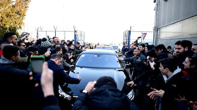 Ibrahimovic surrounded by supporters following his arrival at Linate airport. AFP