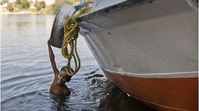 A boy swims in the Nile near Aswan.