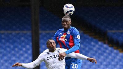 Crystal Palace's striker Christian Benteke beats Aston Villa's defender Kortney Hause as he heads home their first goal. AFP