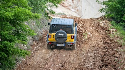 A Wrangler takes on a rocky incline.