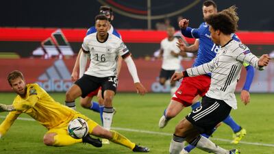 Leroy Sane shoots against Liechtenstein goalkeeper Benjamin Buechel. AFP