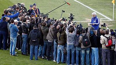Raymond Domenech, the France coach, speaks in front of journalists at the Fields of Dreams stadium in Knysna yesterday.