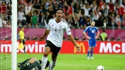 Germany's Sami Khedira celebrates the team's second goal during their quarter-final match against Greece.