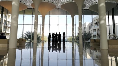 Omani women enjoy the sea view from a hotel lobby in the newly developed property, Al Mouj Muscat, in Muscat, Oman. Reuters