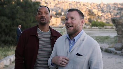 Will Smith and director Guy Ritchie speak to the media during their visit at the Amman Citadel, an ancient Roman landmark, on May 13. Reuters