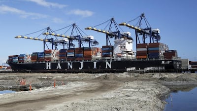 The container ship Hanjin Boston unloads at the Port of Los Angeles in California on Tuesday. Reed Saxon / AP Photo
