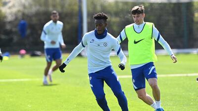 Callum Hudson-Odoi and Mason Mount compete for the ball. Getty