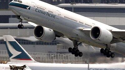 A Cathay Pacific Airways passenger plane takes off at Hong Kong Airport. The carrier and others in the region are being squeezed by Chinese airlines flying direct to Europe.Bobby Yip / Reuters