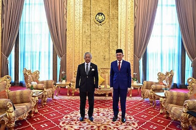 Malaysia's King, Sultan Abdullah, hosted Anwar Ibrahim earlier this week. But he will need time to determine whether Anwar can form the next government. AFP