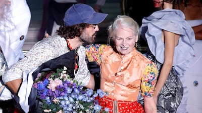 British designer Vivienne Westwood with her husband Andreas Kronthaler at the end of her spring/summer 2018 show during Paris Fashion Week. Charles Platiau / Reuters