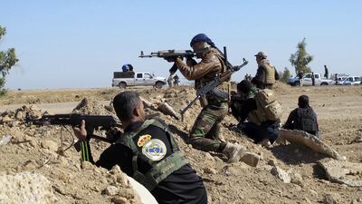 Tribal fighters take part in an intensive security deployment against ISIL militants in the town of Amriyat Al Falluja in Iraq’s Anbar province. Reuters / November 5, 2014