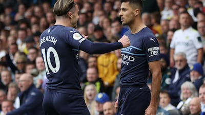 Rodri celebrates scoring the first goal with Jack Grealish. Action Images