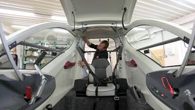 A factory worker assembles an Elbee vehicle. David W Cerny / Reuters