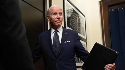 US President Joe Biden exits the room after speaking to the travelling press following a working session with Saudi Arabia’s Crown Prince at the Al-Salam Palace in Jeddah, on July 15. AFP