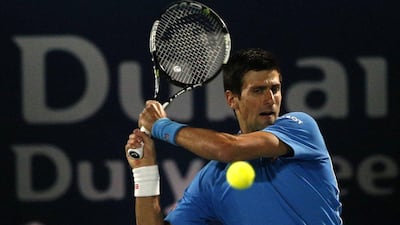 Novak Djokovic in action during his third round match against Andrey Golubev. Karim Sahib / AFP