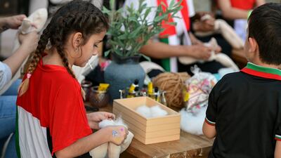 A doll-making workshop as part of National Day celebrations at the library